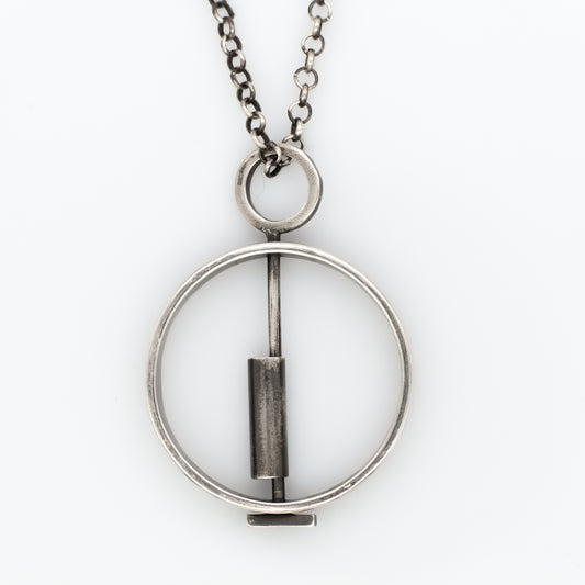 SPINNING MOVABLE GEOMETRIC NECKLACE